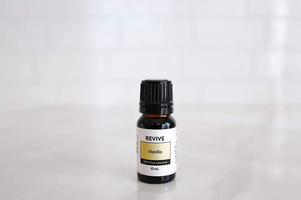 REVIVE Vanilla Oleoresin diffuser bottle shows calming scent for relaxing spaces.