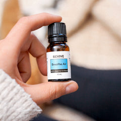 REVIVEEO Breathe Air diffuser in use, filling space with a refreshing scent.