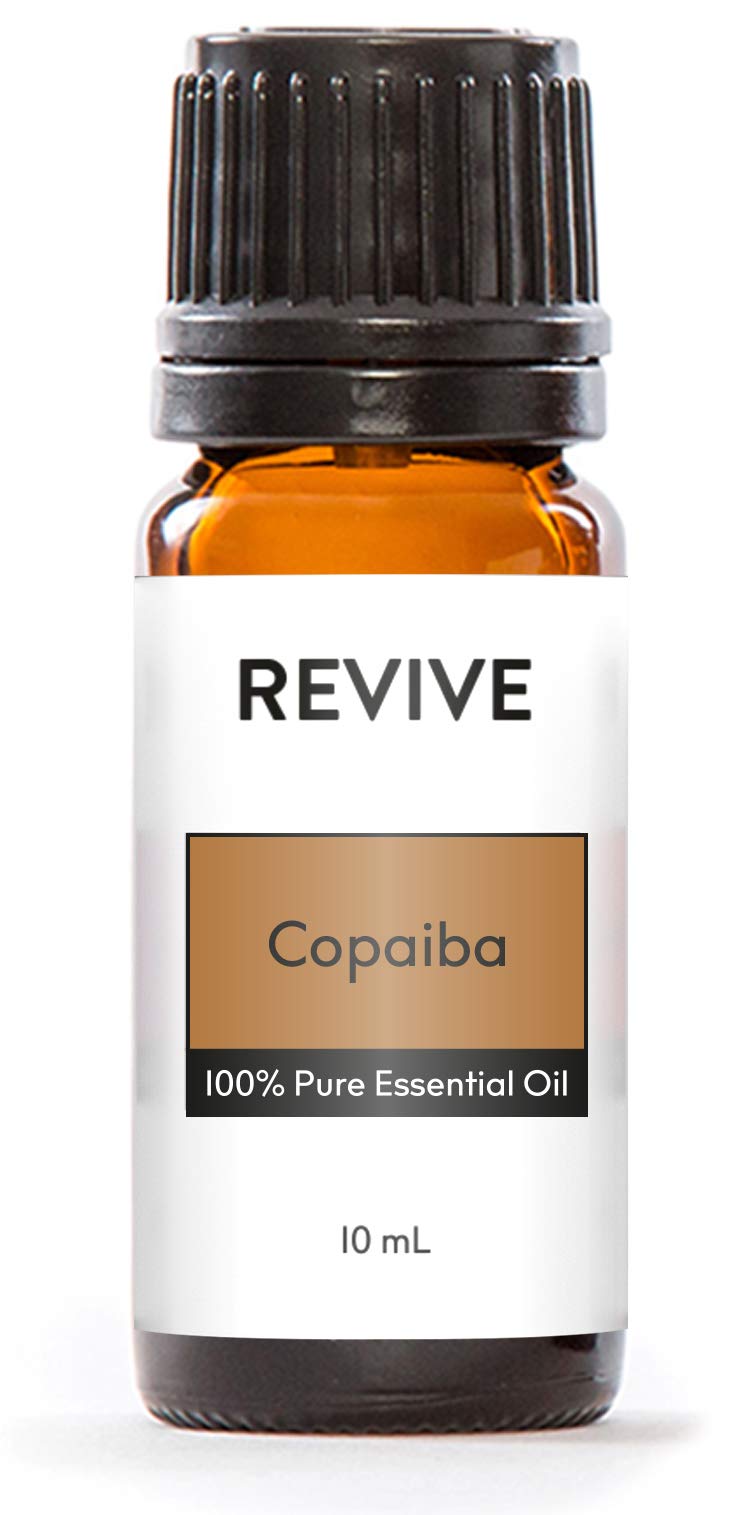 REVIVEEO Copaiba essential oil bottle for diffuser use and calming ambience.