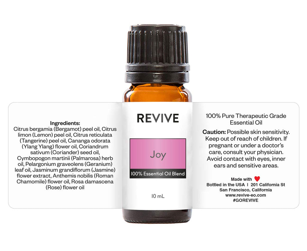 REVIVEEO Joy essential oil blend in a diffuser scene for mood-enhancing ambiance