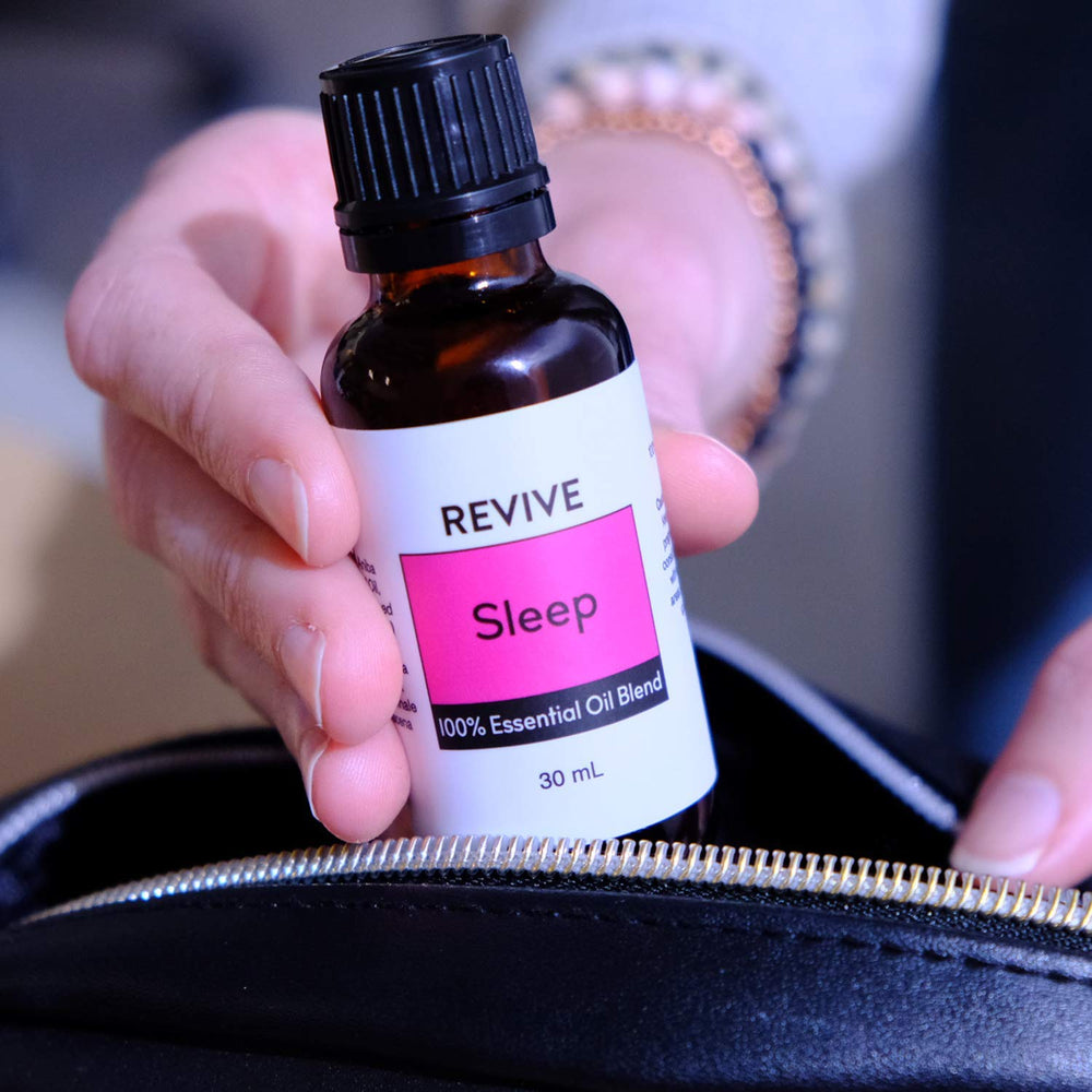 REVIVEEO Sleep diffuser mist fills the space with floral, woody notes.