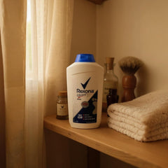 Close-up of Rexona foot powder dispensing for easy application.