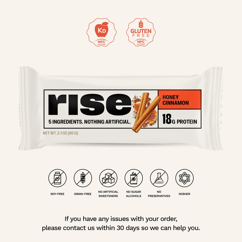 Rise honey cinnamon whey bar close-up reveals creamy texture and natural ingredients.