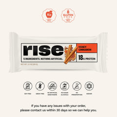 Rise honey cinnamon whey bar close-up reveals creamy texture and natural ingredients.