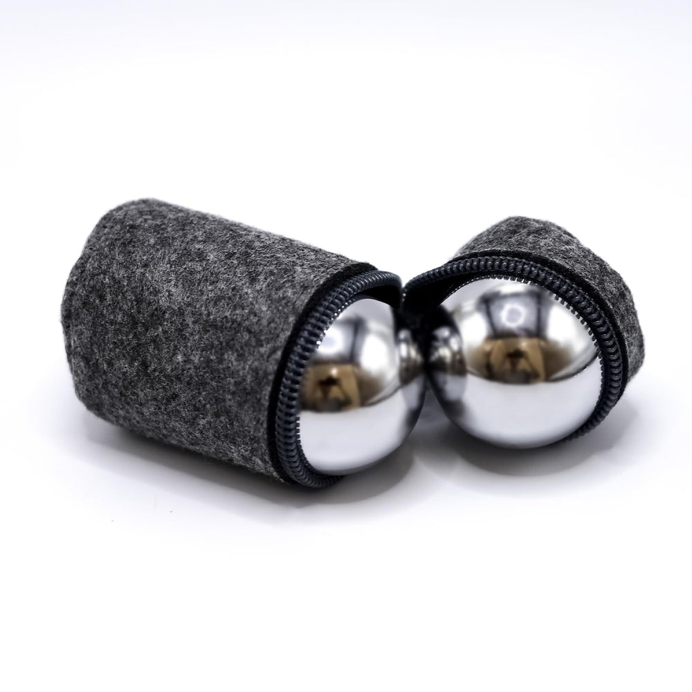 Roadtofree polished stainless steel Baoding ball close-up highlighting durability.