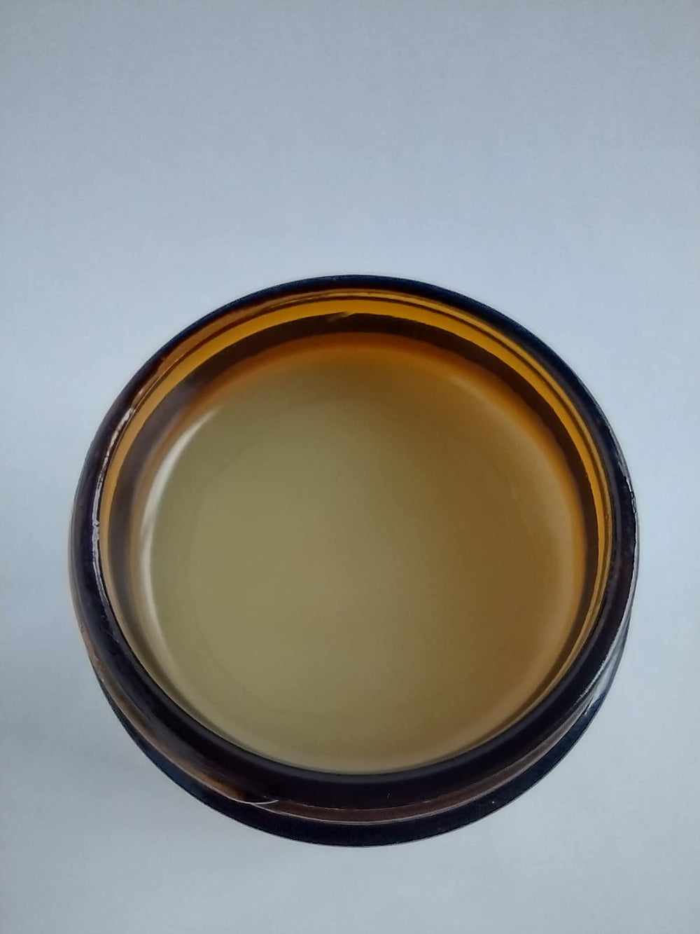 Rocky Ridge Hemp salve cap closeup focuses on clean, minimal packaging.