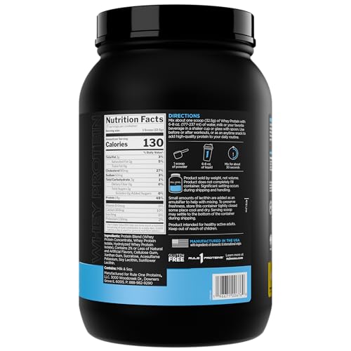 Scoop of Rule 1 Whey Protein Banana Creme beside the bottle for quick shakes.