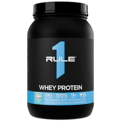 Rule 1 Whey Protein tub front shows premium packaging for daily fueling.