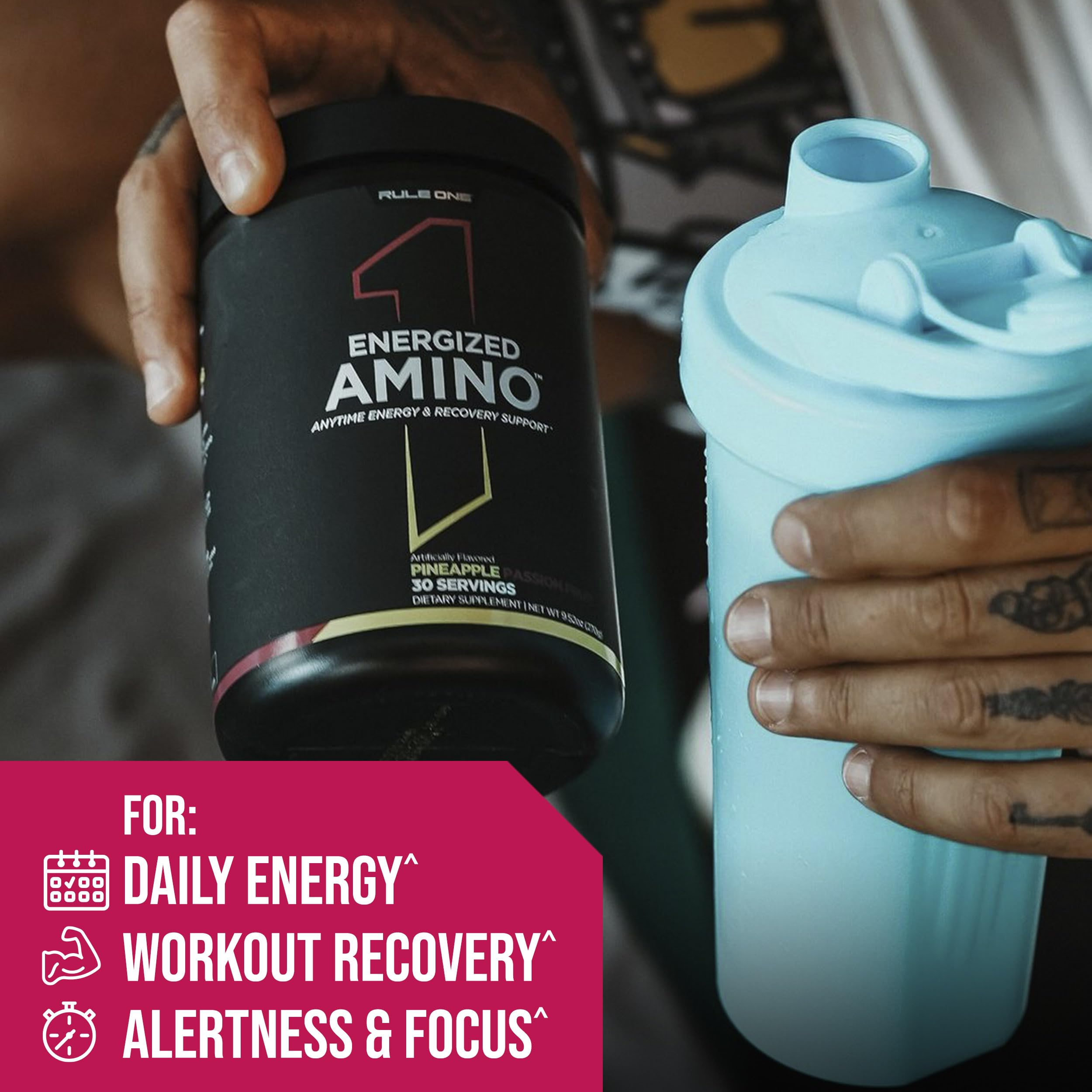 Rule 1 Energized Amino powder stirred into water for a post-workout drink