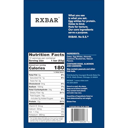 RXBAR Blueberry bar bite highlighting blueberry specks and nut pieces.
