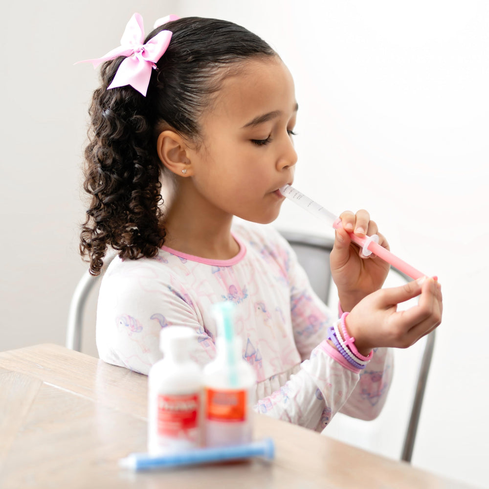 Ryan & Rose Cutie Dose 10 mL dose capability demonstrated in use.