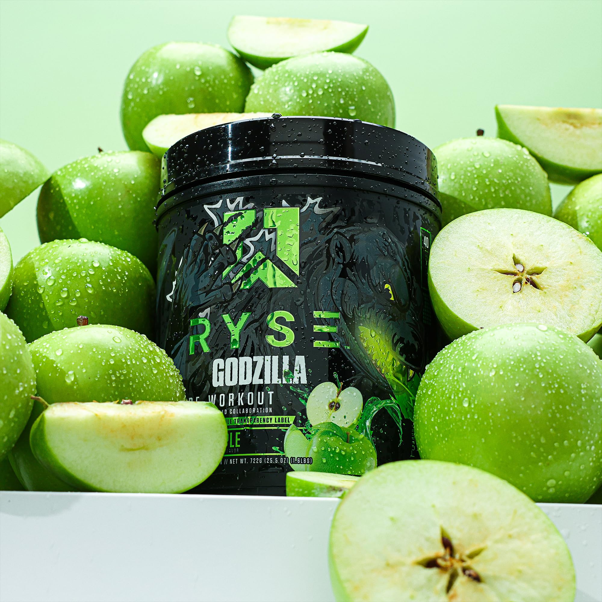 Energetic gym scene with RYSE Godzilla Green Apple fueling focus and pump