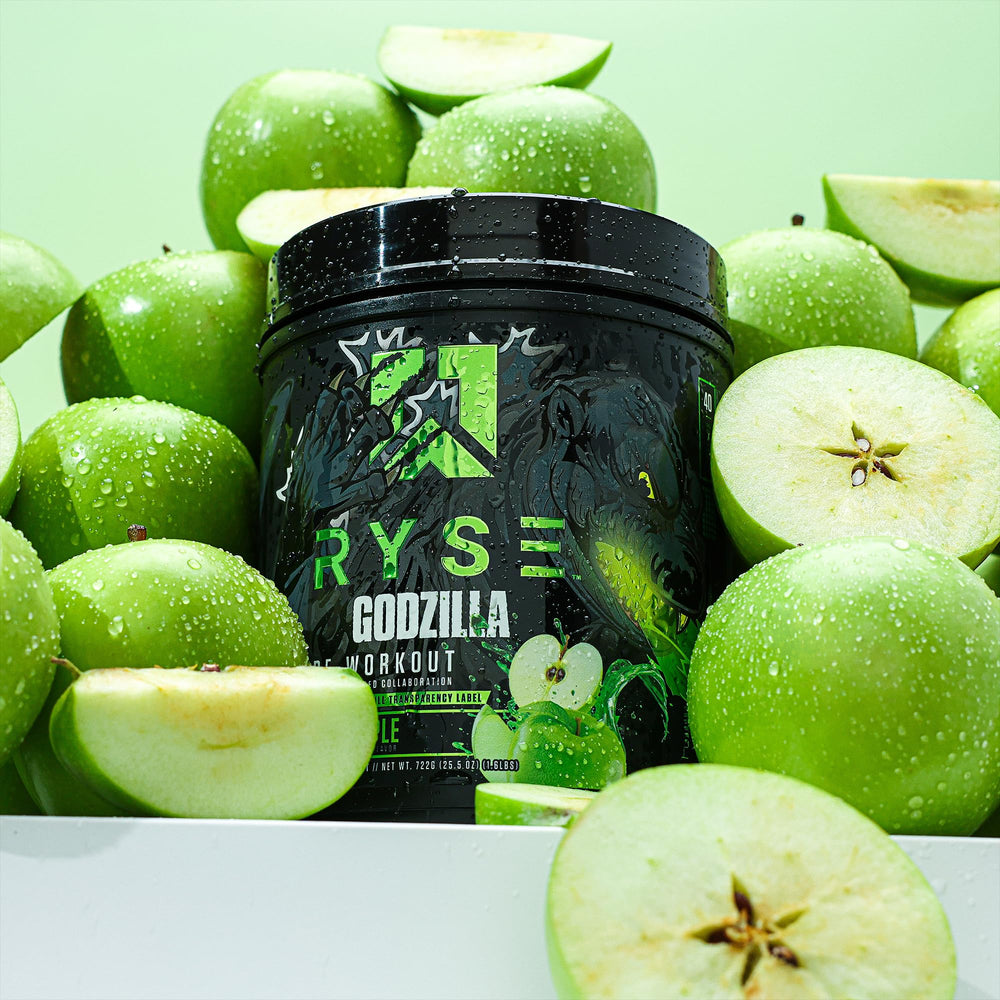 Energetic gym scene with RYSE Godzilla Green Apple fueling focus and pump