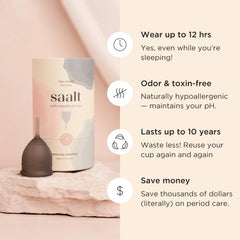 Saalt Soft cup being cleaned with mild soap for easy care and quick sanitization.