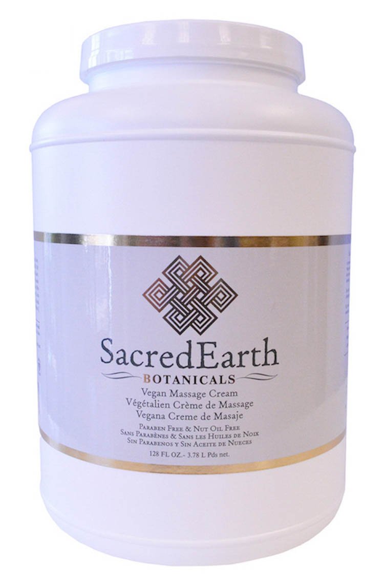 Sacred Earth Botanicals vegan massage cream bottle, unscented and water dispersible for easy cleanup after sessions.