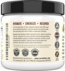 Sacred Eats Keto Electrolyte Powder lemon raspberry glass reveals refreshing flavor.