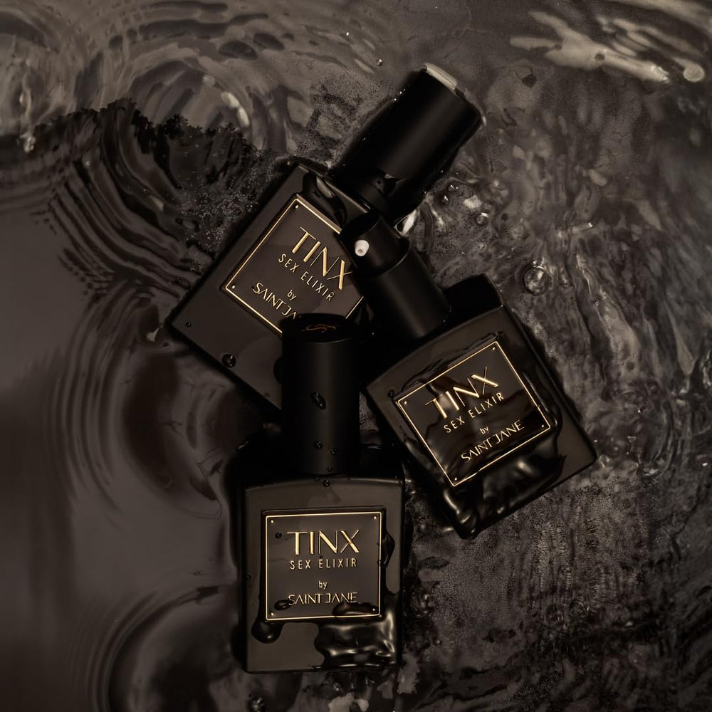 SAINT JANE Tinx Elixir Intimacy Oil label notes fragrance-free, latex-friendly formula
