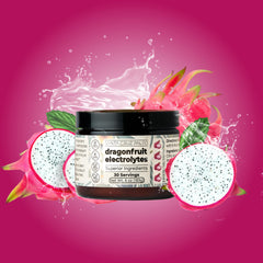 Dragon fruit electrolyte powder dissolving in a glass of water for hydration.
