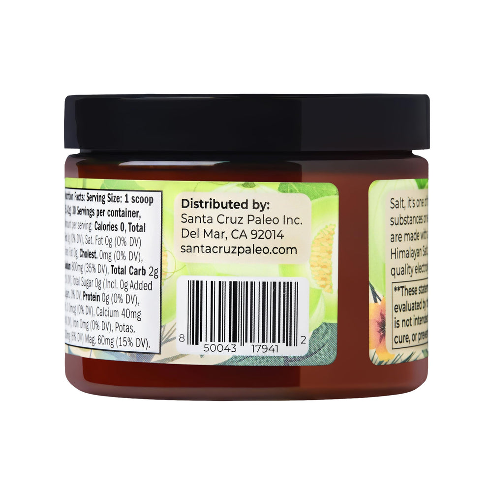 Hiker-friendly Santa Cruz Paleo Electrolyte Powder bottle on a trail
