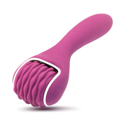 Scarroller scar tissue massager in purple aiding post-surgery flexibility.