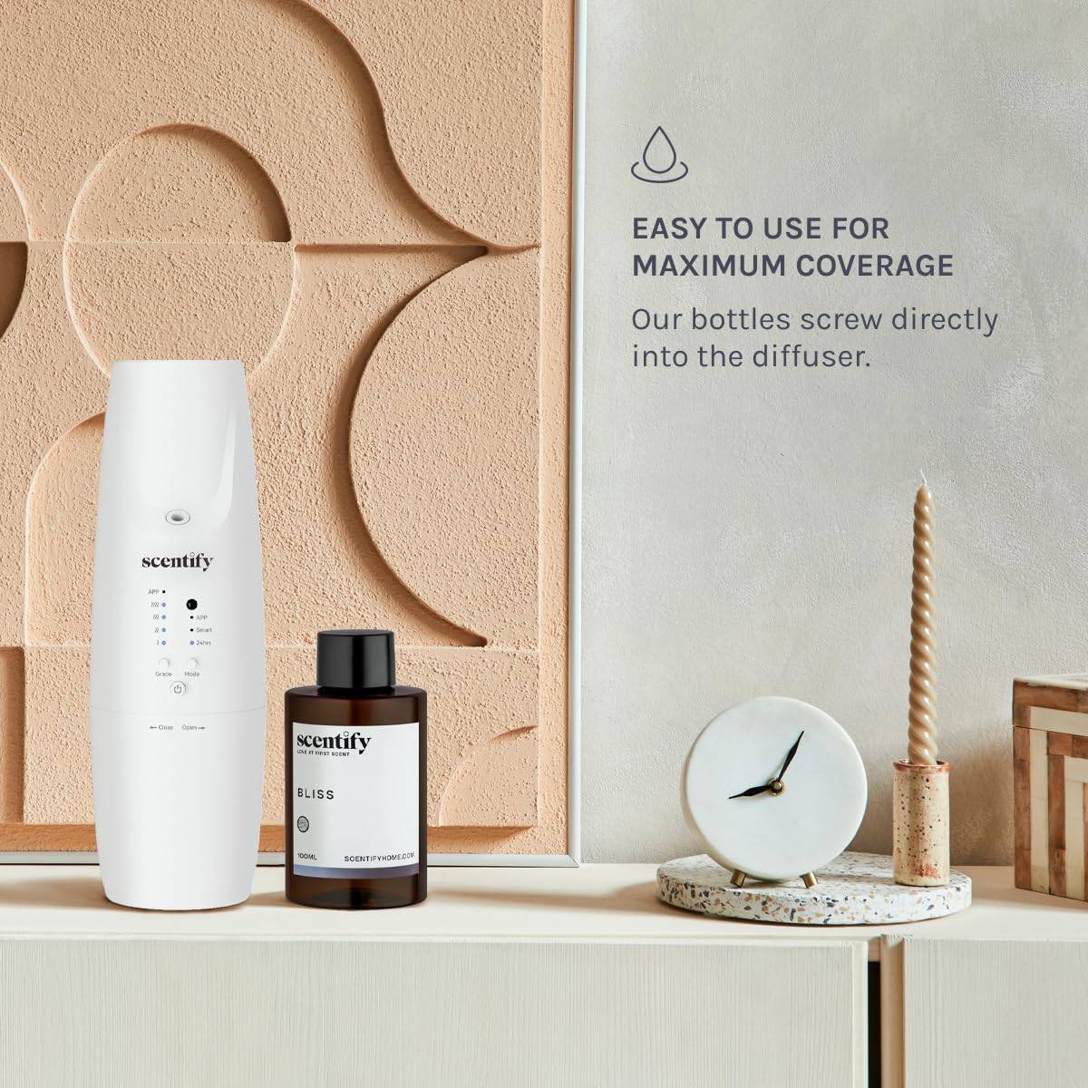 Scentify Bliss aroma oil in a tranquil study for focused calm.