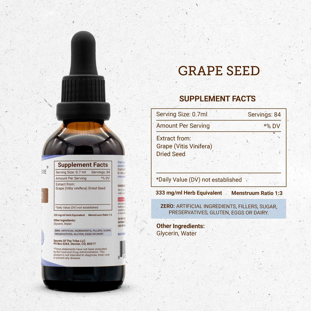 Grape seed tincture in a glass with droplets for easy dosing.