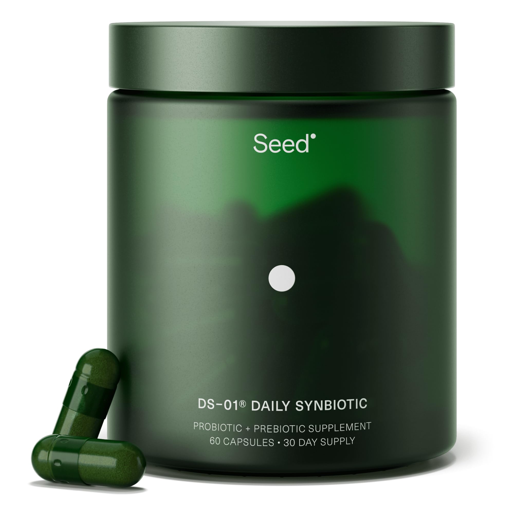 Seed DS-01 bottle on table supports daily gut health with a dual synbiotic formula.