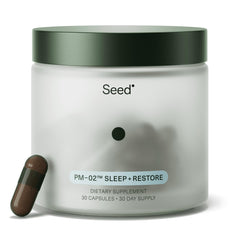 Seed PM-02 Sleep + Restore bottle closeup for a restful nightly routine.