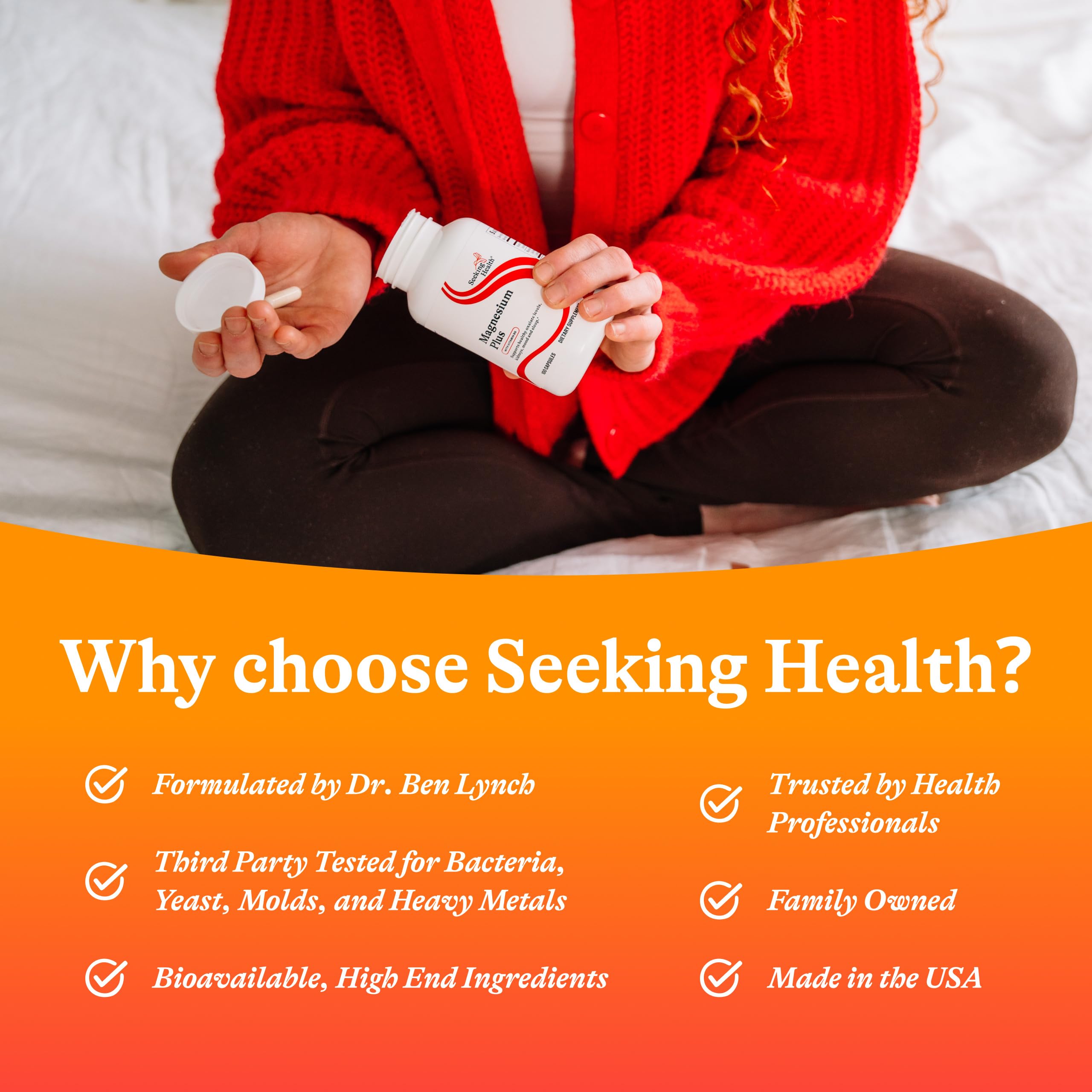 Seeking Health Magnesium Plus capsules in hand captures portable daily supplement.