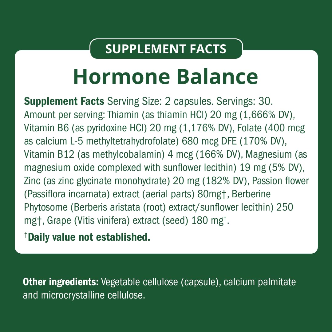 Semaine Hormone Balance on nightstand with glass for deeper sleep potential.