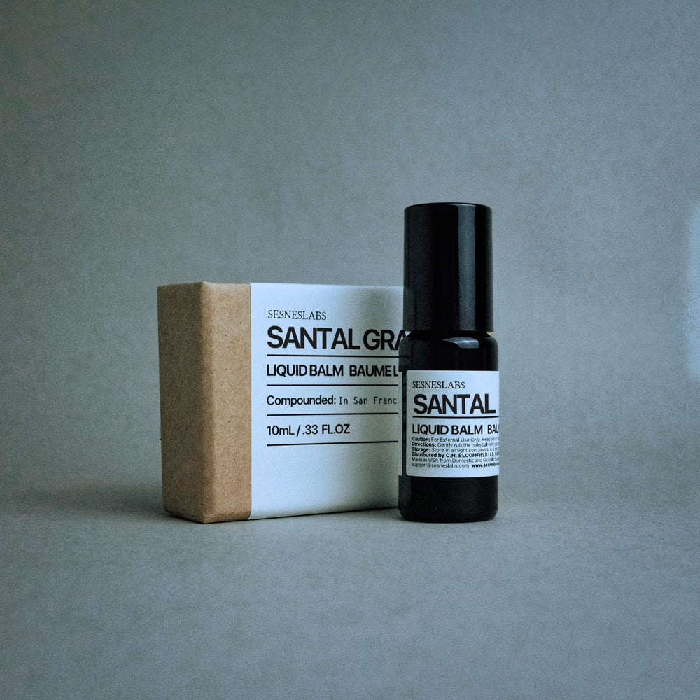 Sesneslabs Santal Grass packaging evokes premium niche fragrance experience.