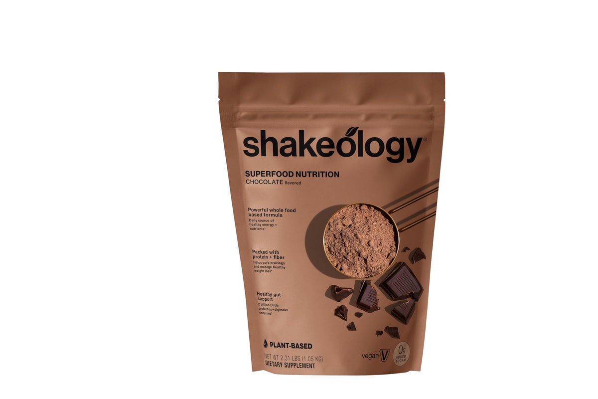 Shakeology chocolate bottle pour aids weight management with 0g added sugar and protein.