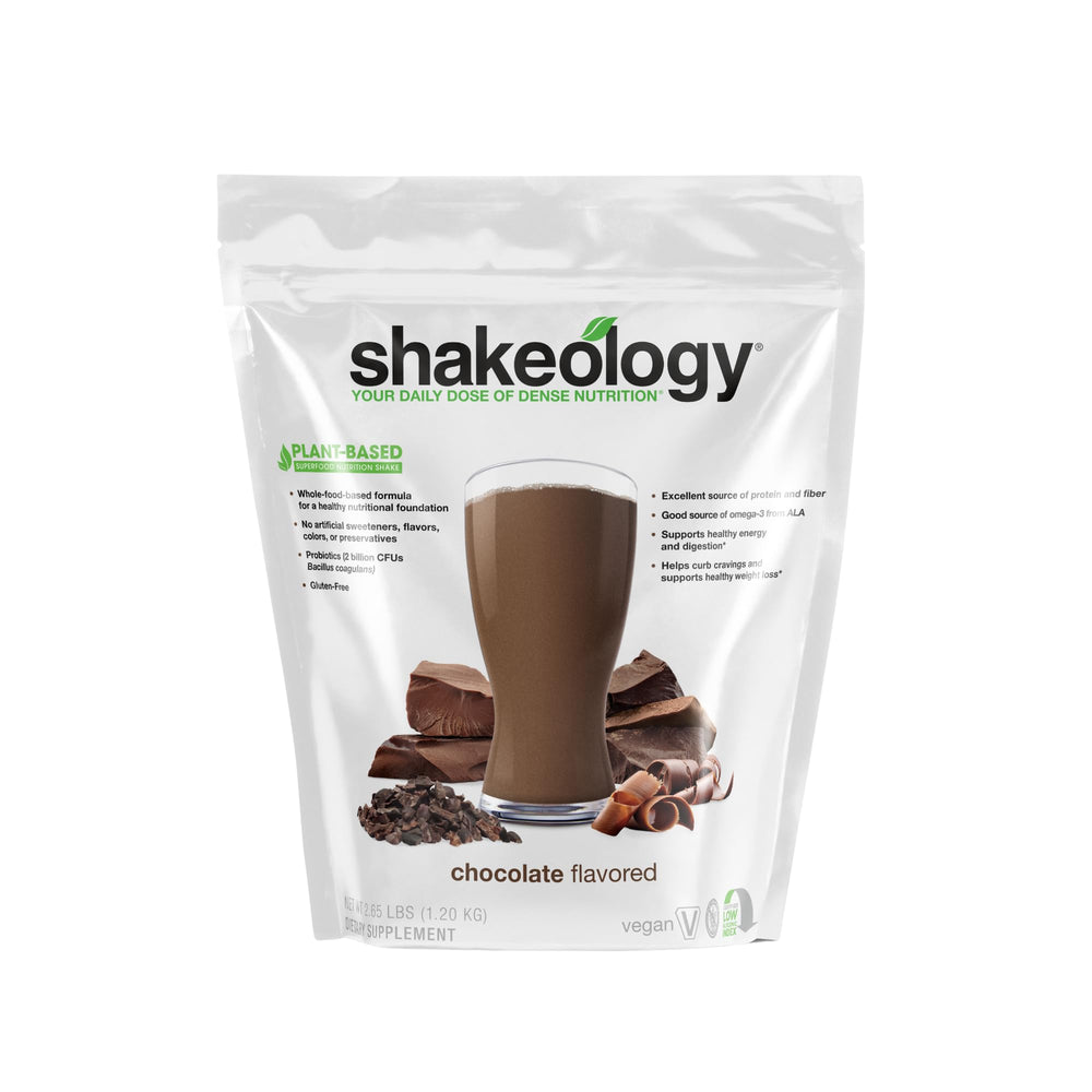 Shakeology chocolate plant-based protein tub front view highlighting gluten-free formula.