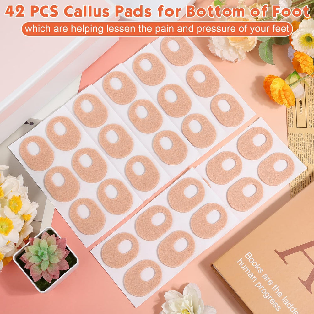 Shynek corn pads for feet adhesive oval stay in place while protecting callused areas.