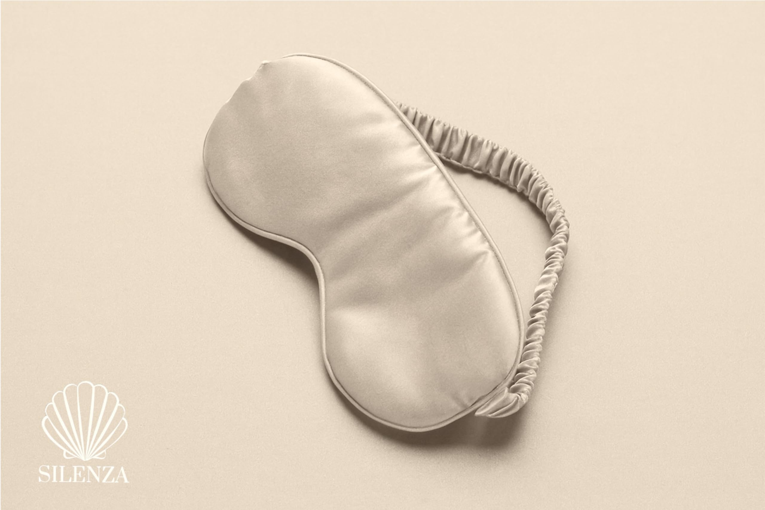 Silenza sleep mask worn to achieve complete darkness and comfort.
