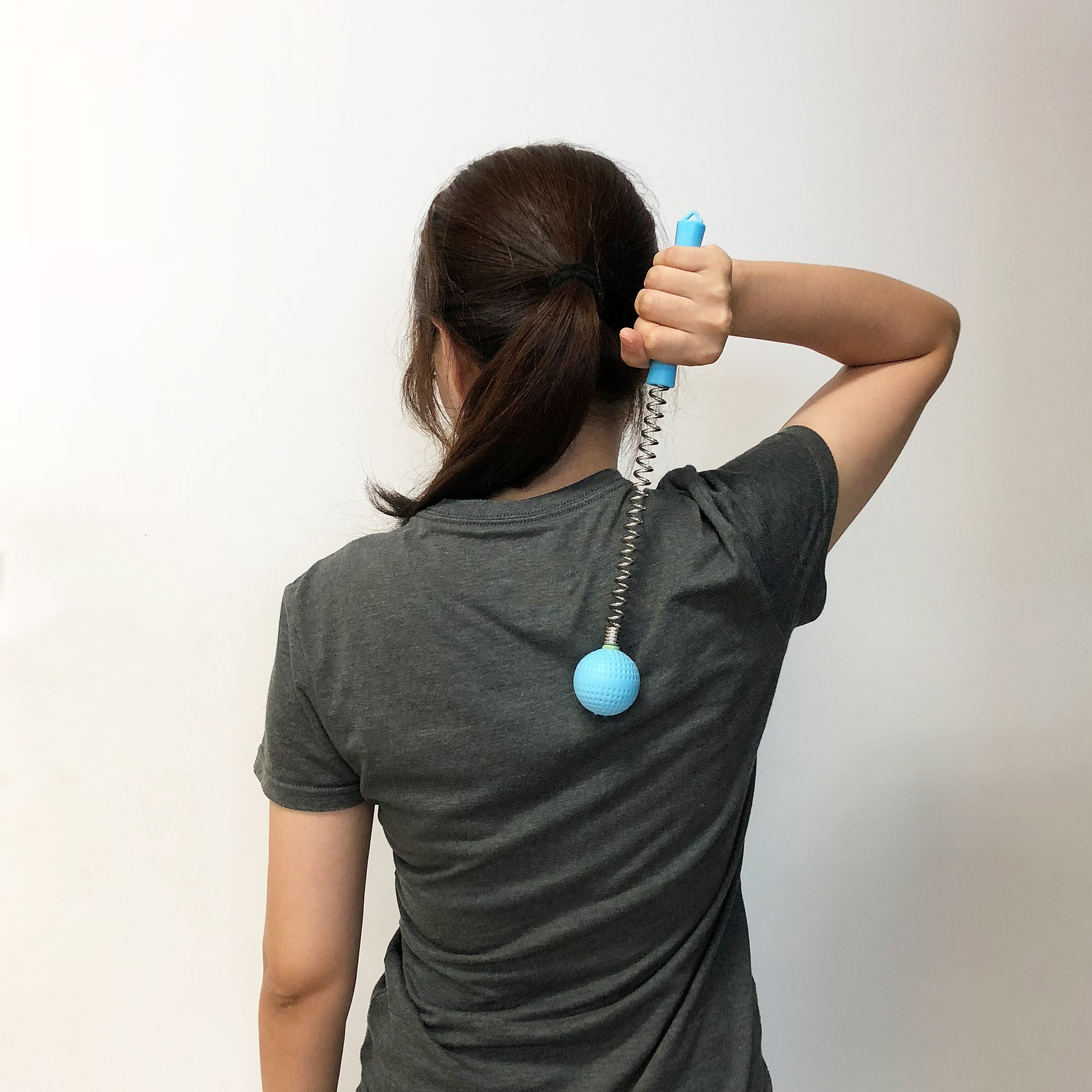 SinLoon spring-handle design concentrates tapping massage for deeper muscle release.