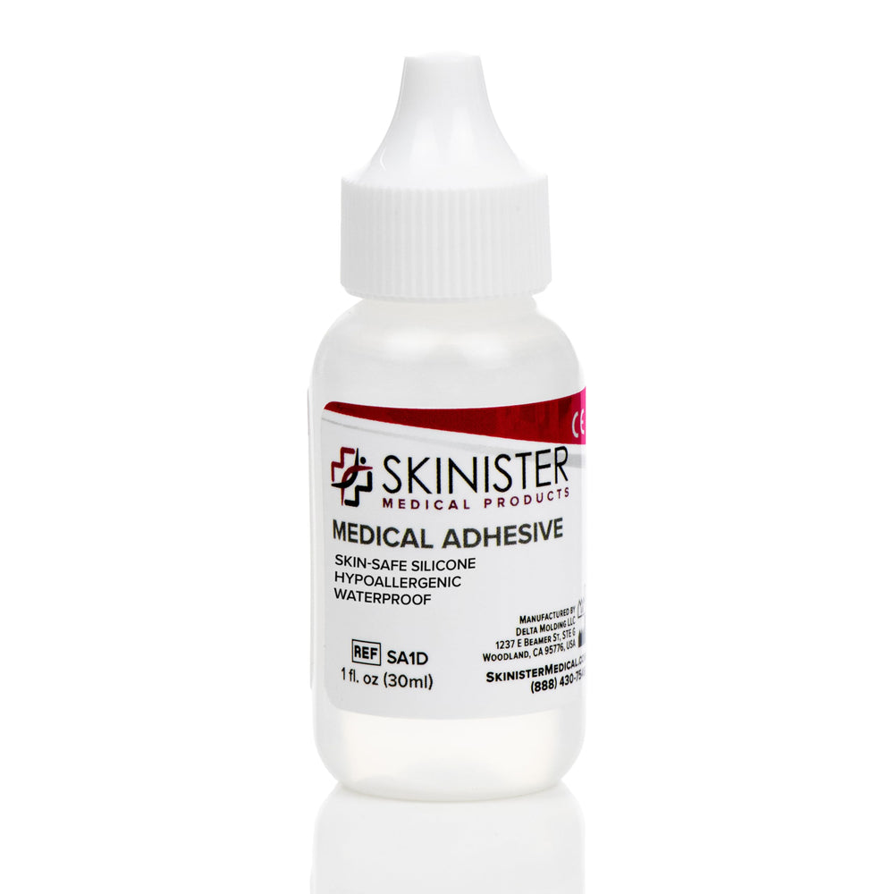 Skinister Medical Adhesive Dropper bottle close-up for precise, secure adhesion.