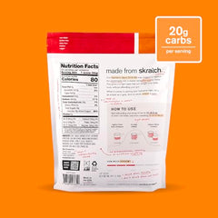 Skratch Labs Hydration Powder being poured into a glass for quick rehydration
