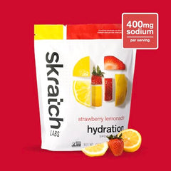 Glass with mixed Skratch Labs Strawberry Lemonade hydration drink after training