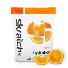 Skratch Labs Hydration Powder packaging displaying orange flavor for on-the-go hydration.