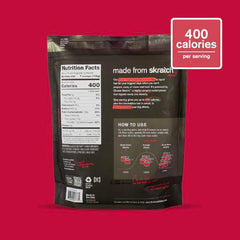 Close-up of Skratch Labs raspberry flavor powder mixed in glass