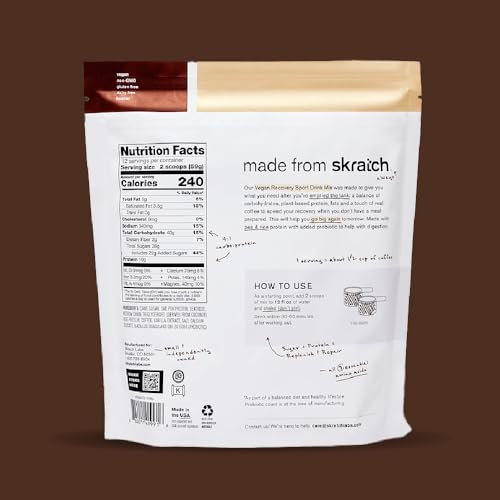 Skratch Labs Recovery Oat Milk Latte powder dissolving in water.