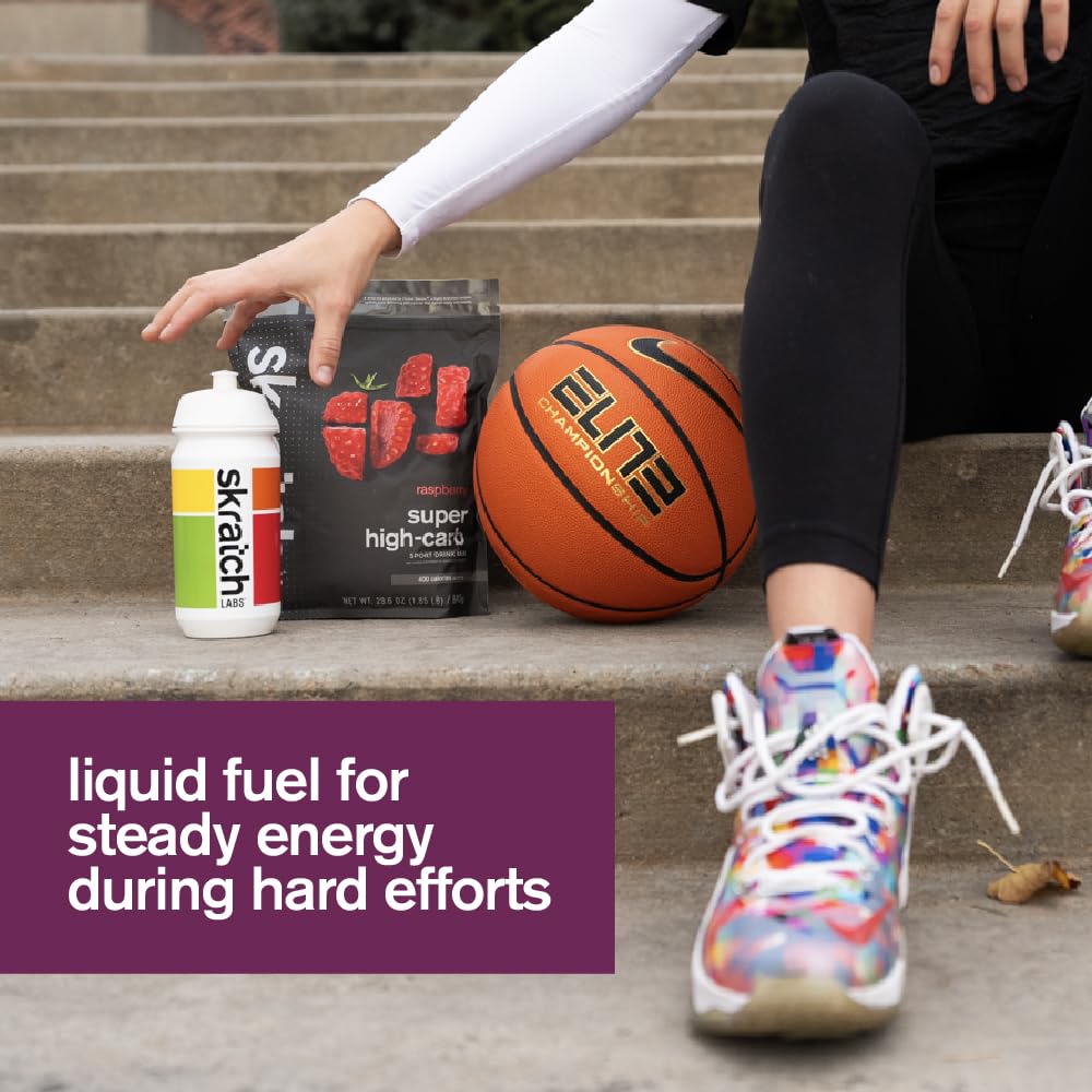 Serving scoop beside a cup of Skratch Labs powder