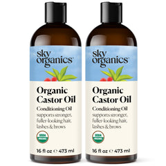 Sky Organics Castor Oil bottle pouring for scalp nourishment.