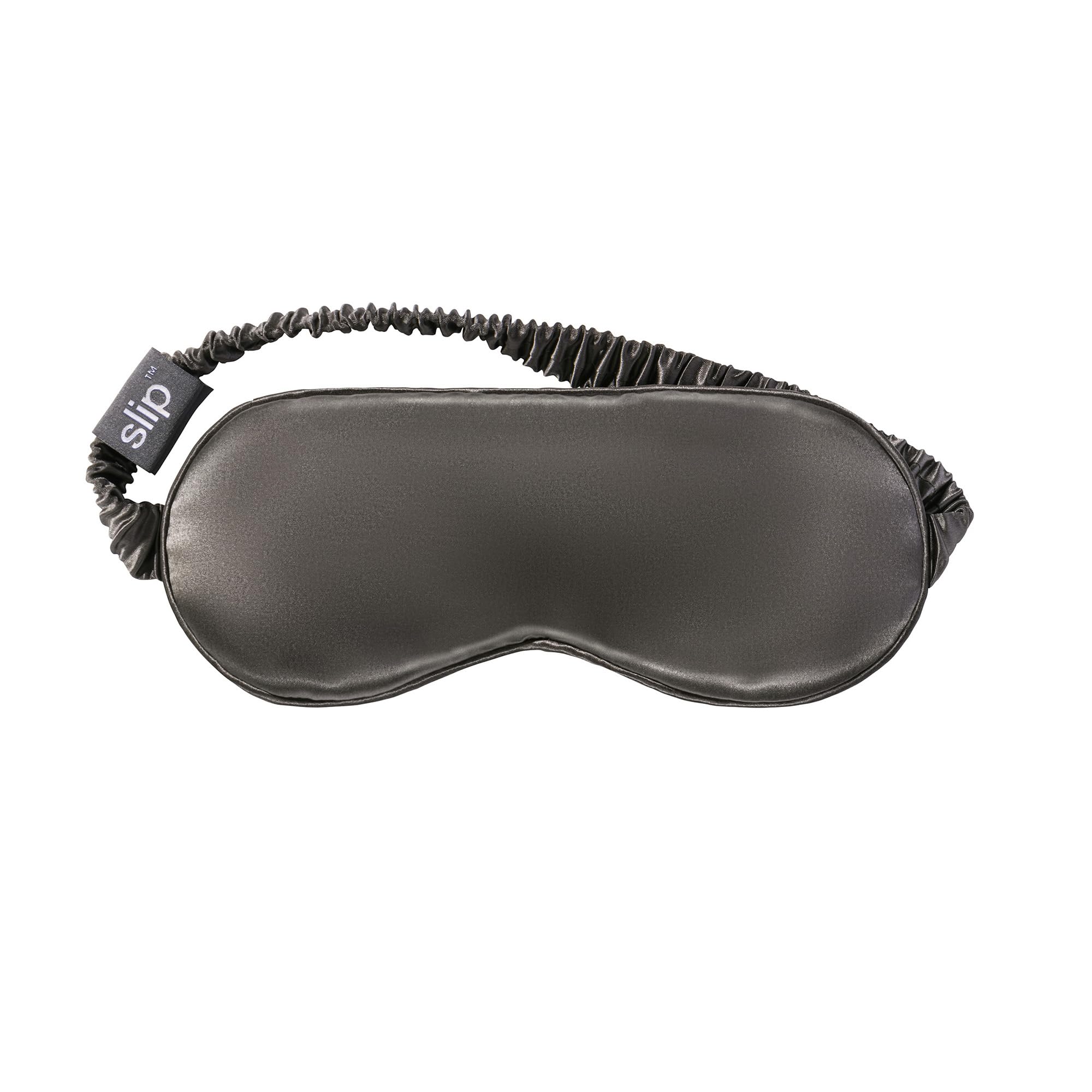 SLIP sleep mask shown with eyes closed delivering complete light blockage for restful sleep.