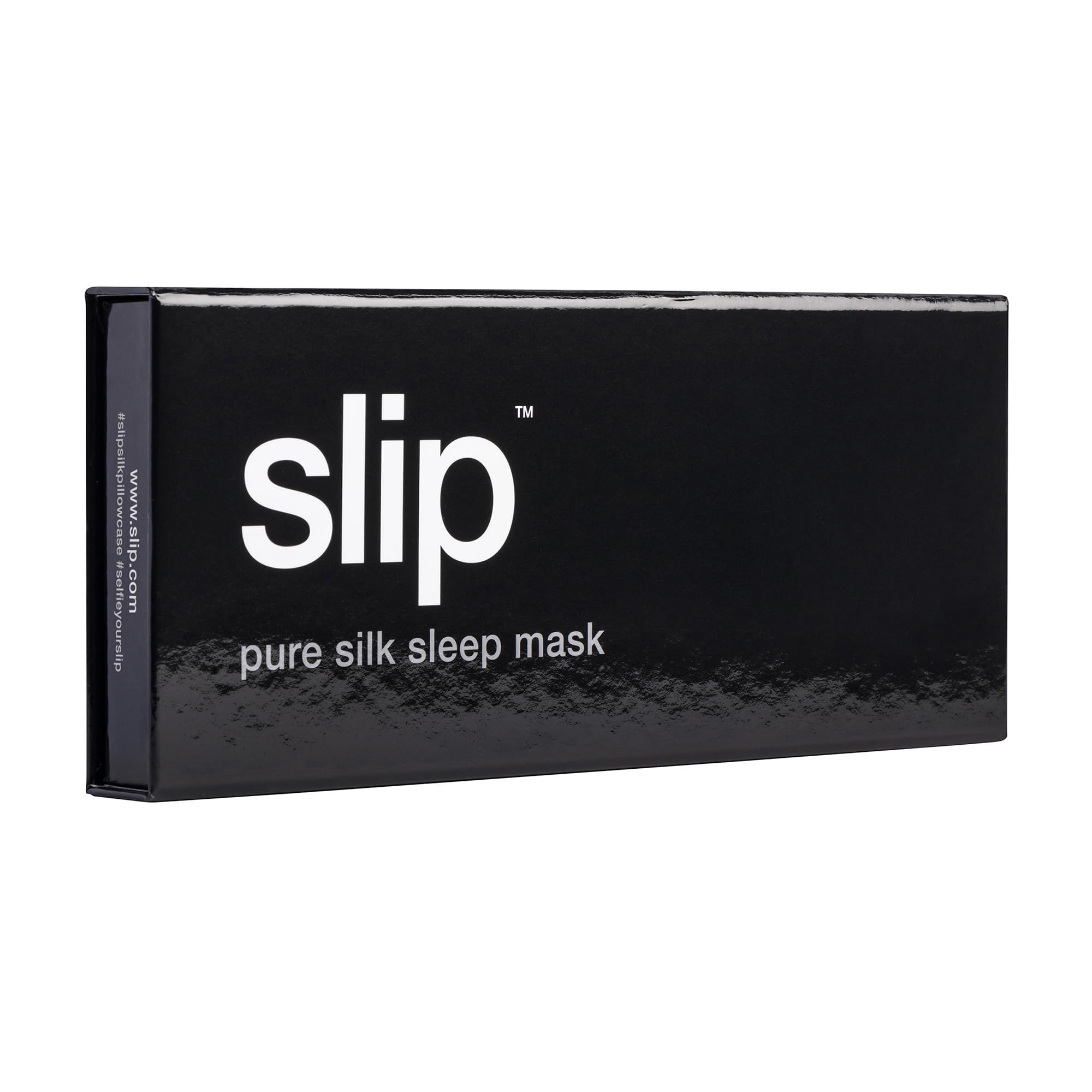 SLIP Pure Silk Sleep Mask in black worn over eyes for full light block.