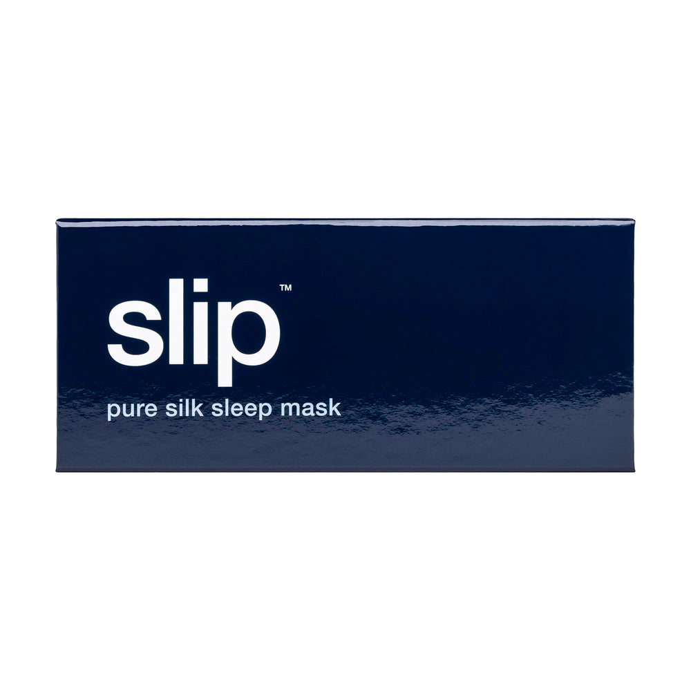 SLIP Pure Silk Sleep Mask Navy travel-ready with adjustable strap for comfort.