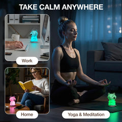 SlowRise lamp user practicing mindfulness with eyes closed for focused breathing.