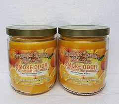 Smoke Odor Exterminator orange lemon jar candle front view helps freshen spaces and reduce tobacco odors.