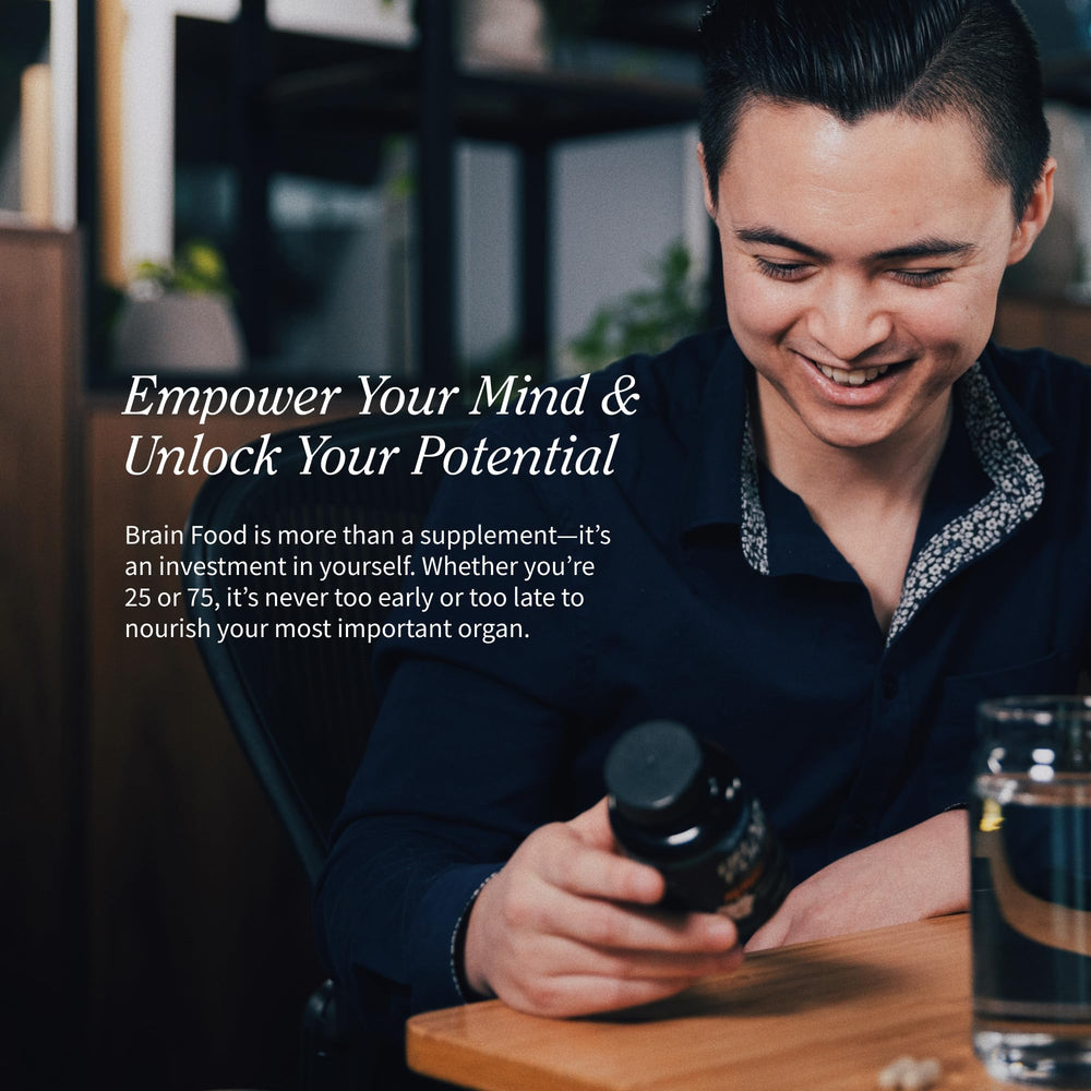 Snap Supplements Brain Booster glass of water with bottle in background